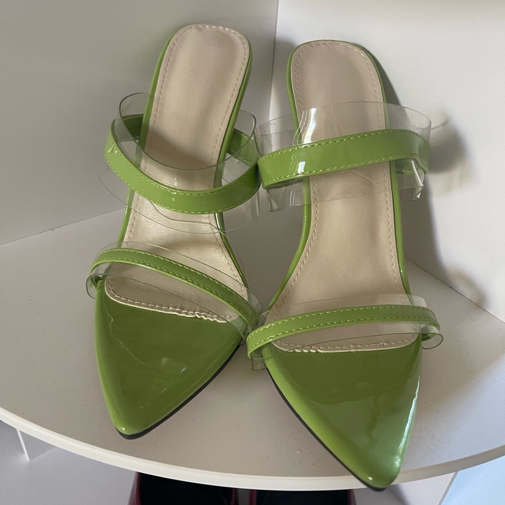 Worn once, green and clear heels